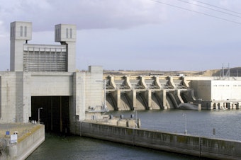 caption: FILE - This Oct. 24, 2006 file photo shows file photo shows the Ice Harbor dam on the Snake River in Pasco, Wash.  (AP Photo/Jackie Johnston, File)