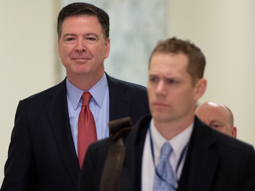 caption: Former FBI Director James Comey arrives to testify during a closed House Judiciary Committee meeting on Capitol Hill in Washington, DC, December 17, 2018.