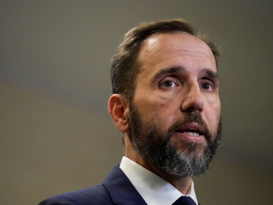 caption: Special counsel Jack Smith has been consulting with other officials inside the Justice Department for weeks about the Jan. 6 case against Donald Trump. 