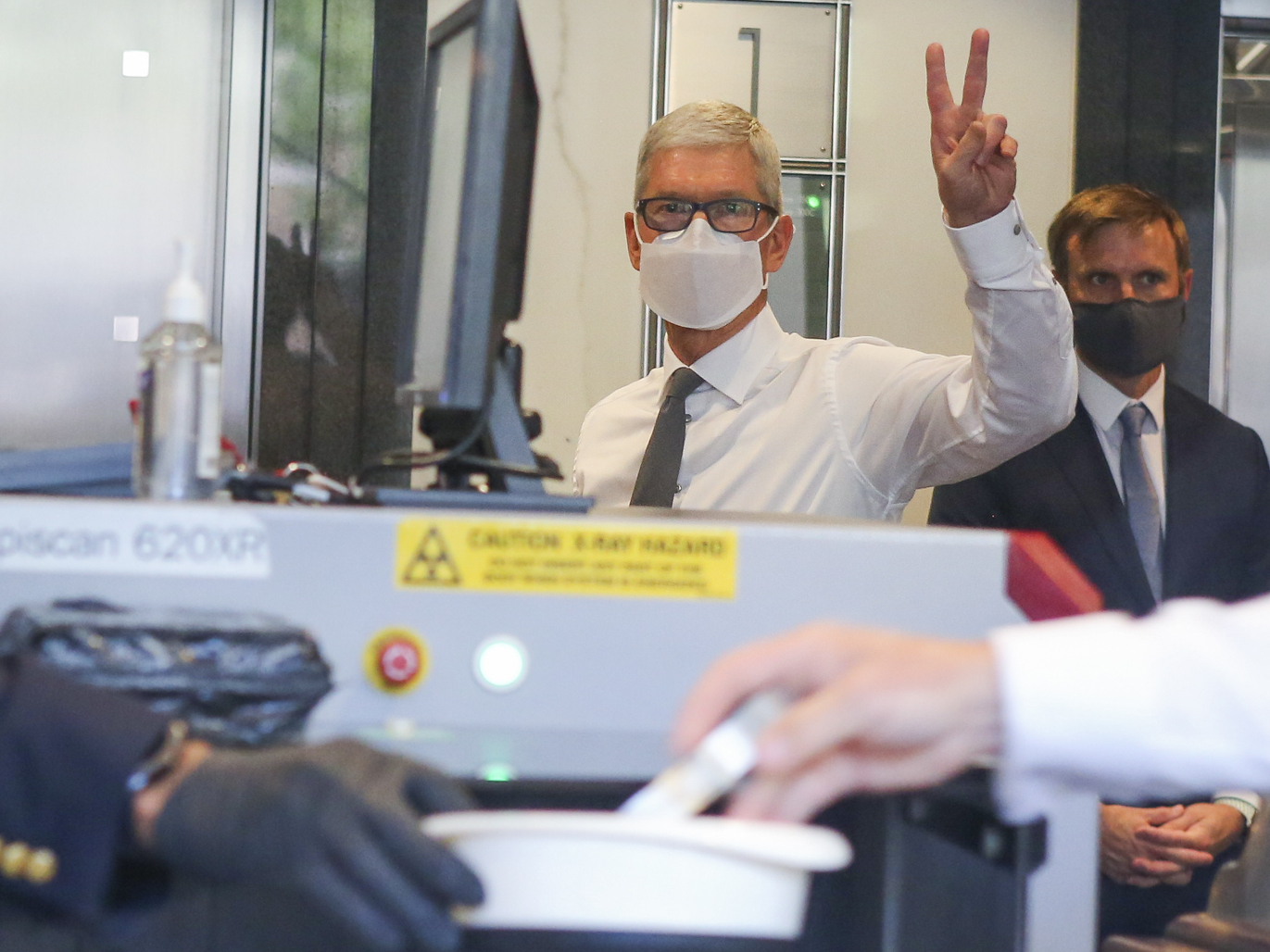 caption: Apple CEO Tim Cook arrives Friday at U.S. District Court in Oakland, Calif.