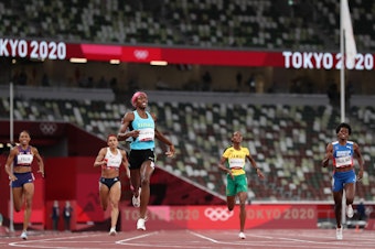 caption: Shaunae Miller-Uibo of the Bahamas wins the gold medal during the women's 400-meters during the Tokyo Olympic Games in August 2021.