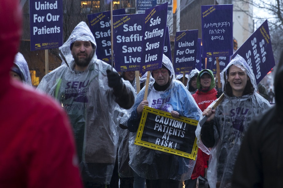 caption: Nurses and caregivers strike on Tuesday, January 28, 2019, outside of the Swedish Ballard Campus along NW Market Street in Seattle. 