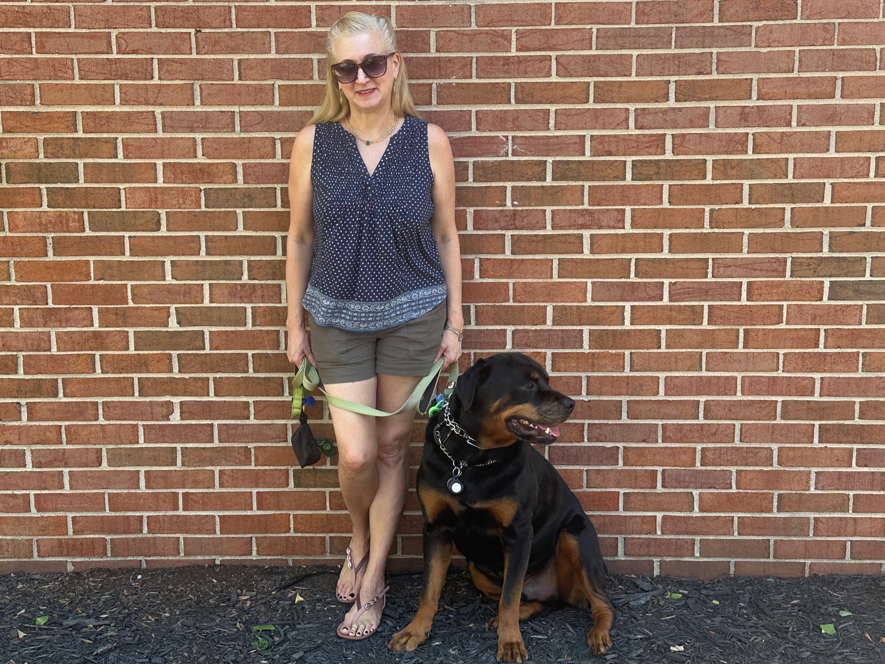 caption: Lara Friedman and her dog, The Dude.