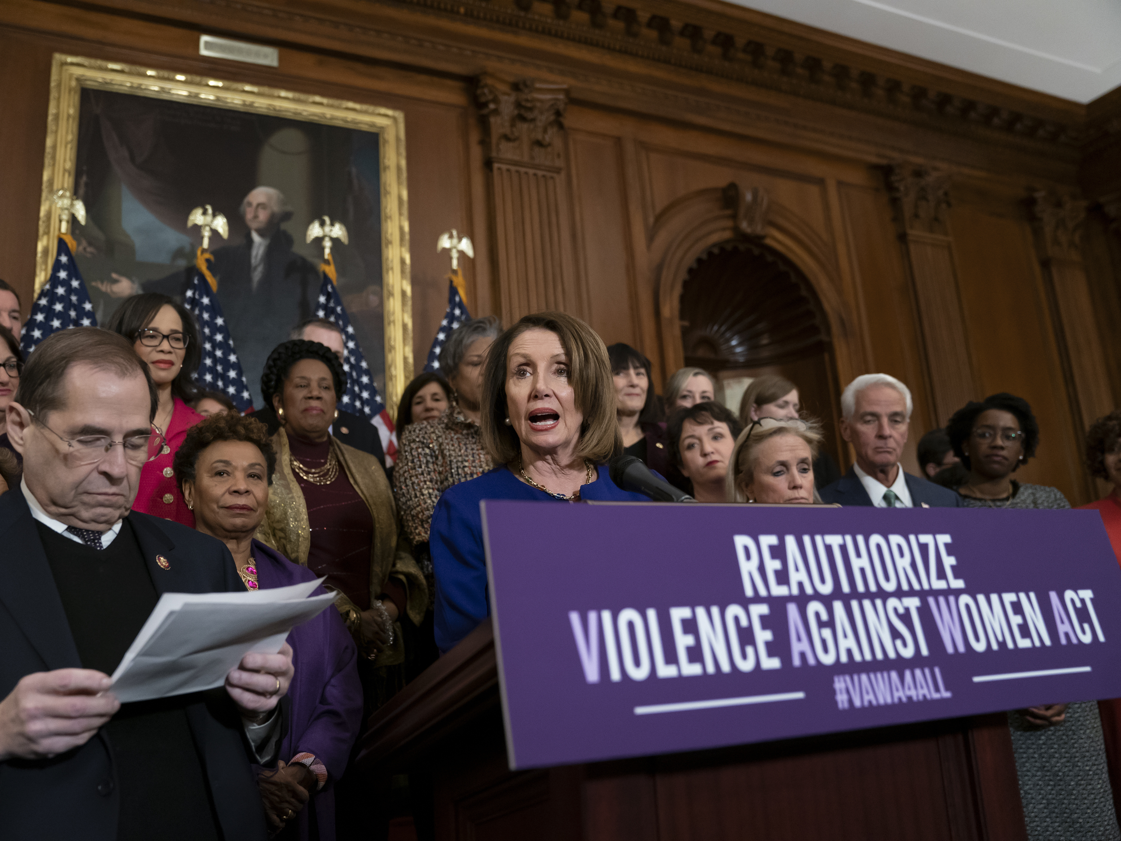 caption: Speaker Nancy Pelosi, D-Calif., leads a 2019 press conference with fellow Democrats in support of the Violence Against Women Act.