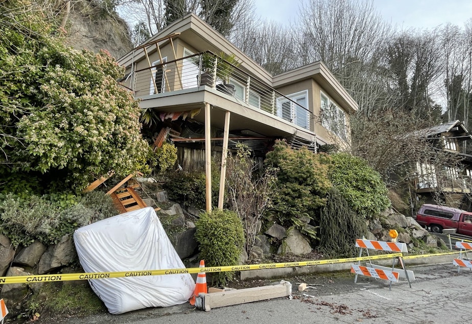 caption: A house on the southern slope of Magnolia Hill in Seattle that slid off its foundations earlier this month.