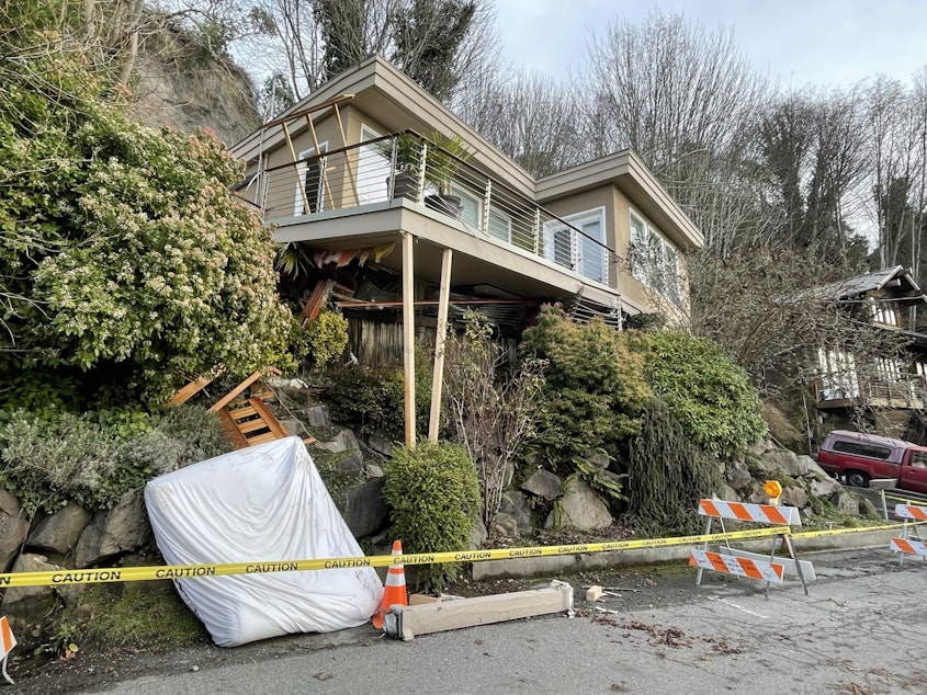 caption: A house on the southern slope of Magnolia Hill in Seattle that slid off its foundations earlier this month.