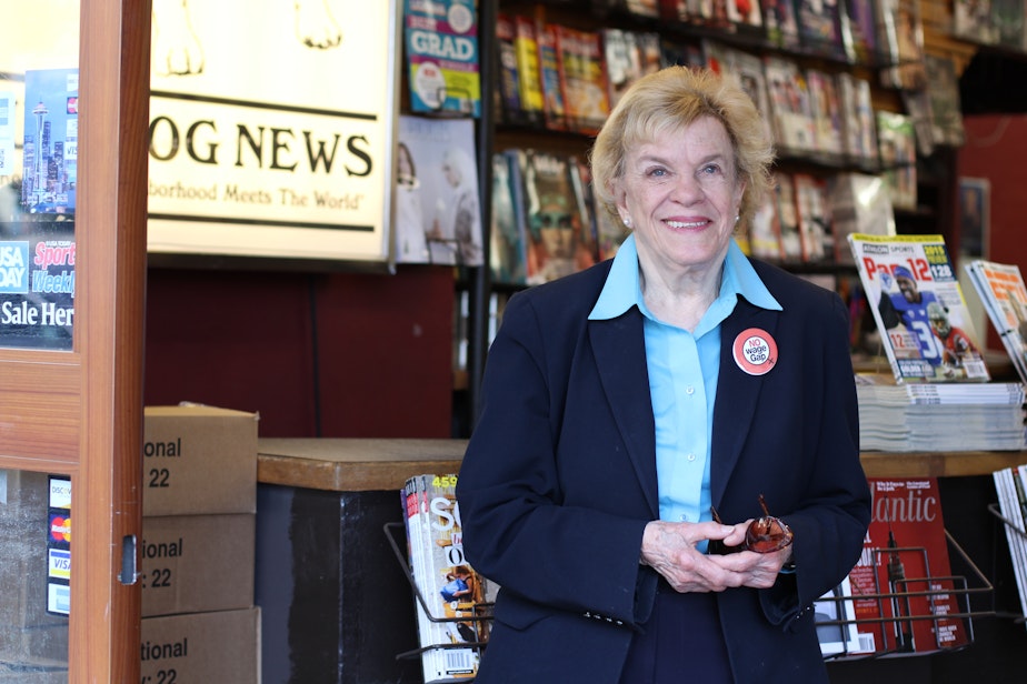 caption: City Councilmember Jean Godden at Bulldog News in the University District.