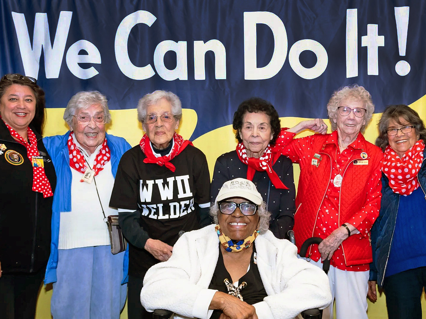 caption: "Rosies" — including Jeanne Gibson and Marian Sousa — are pictured at the Rosie the Riveter National Historical Park's "Riveter Days" in Richmond, Calif., in March 2023.