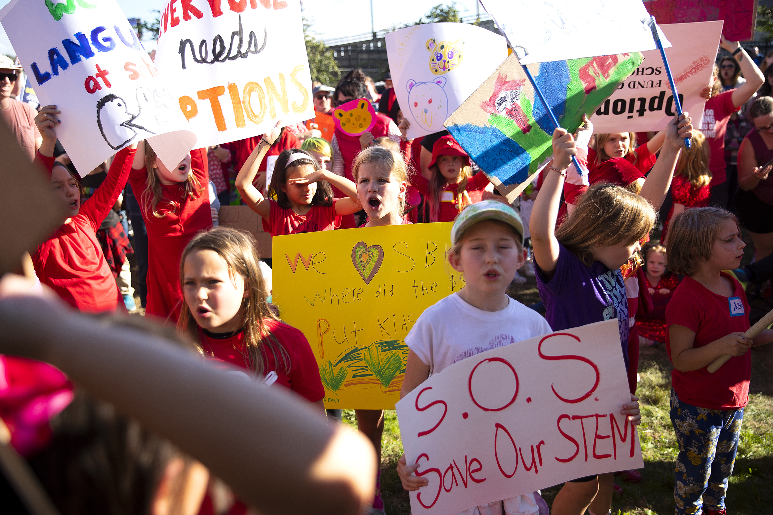 caption: Hundreds of Seattle Public Schools students and parents gathered for a rally demanding that schools remain open, ahead of the Seattle Public Schools board meeting on Wednesday, September 18, 2024, at the John Stanford Center for Educational Excellence building in Seattle. 