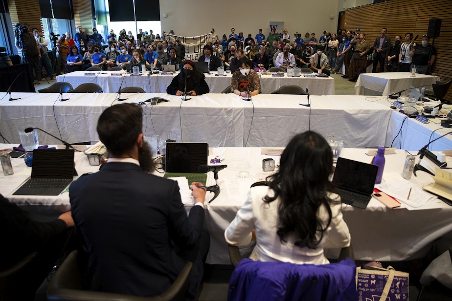 caption: University of Washington students, including Hanady Shaqur, a 3rd-year Palestinian student, left, speak to the UW Board of Regents and implore them to cut ties with Boeing and divest from Israel on Thursday, May 9, 2024, during a UW Board of Regents meeting on campus in Seattle. Shaqur shared the number of family members that she has lost since the start of the conflict. 