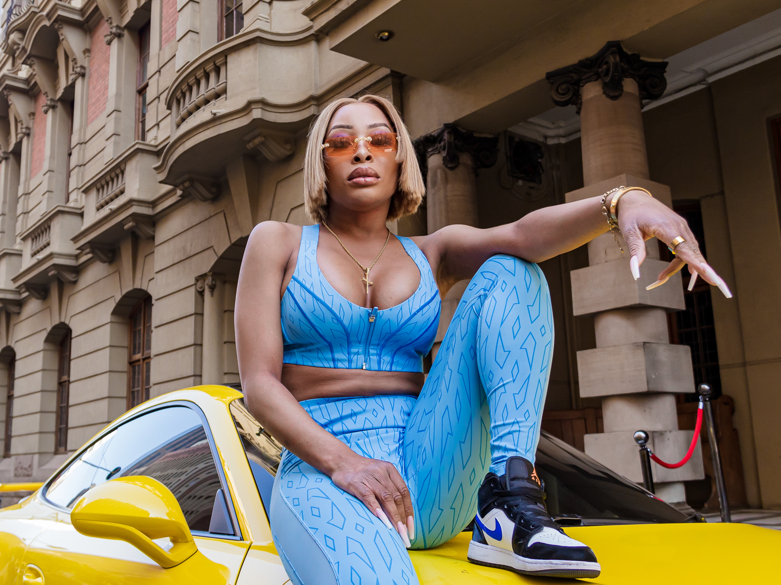 caption: South African actress Khanyi Mbau, one of the stars of Netflix's new original reality show set in Africa, <em>Young, Famous & African. </em>