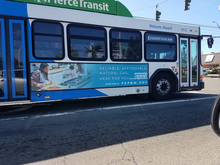 caption: A Pierce Transit bus in Tacoma advertising and running on natural gas