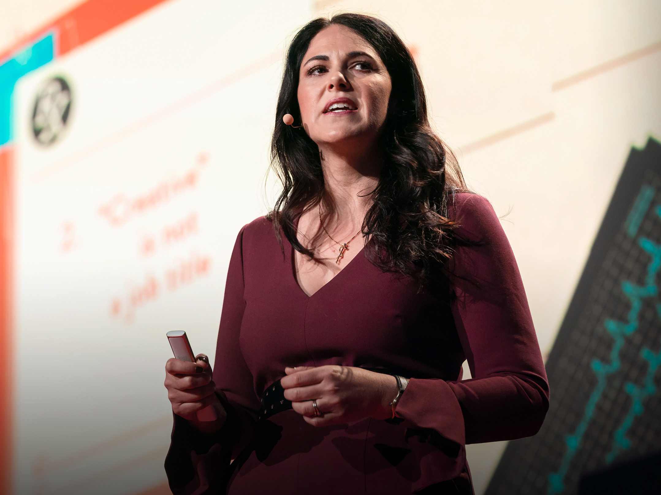 caption: Writer and Anthropologist Laurel Braitman speaks from the TED stage.