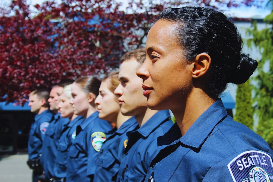 caption: (Archive) Kimberly Rodriguez, a new recruit for the Seattle Police Department, on her first day at the police academy in 2015.