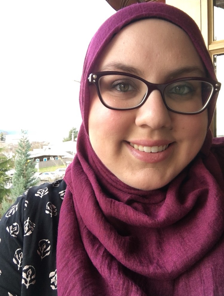 caption: Amina Al-Said is a producer for Week in Review and The Record, and is an alumnae of the RadioActive program at KUOW. 