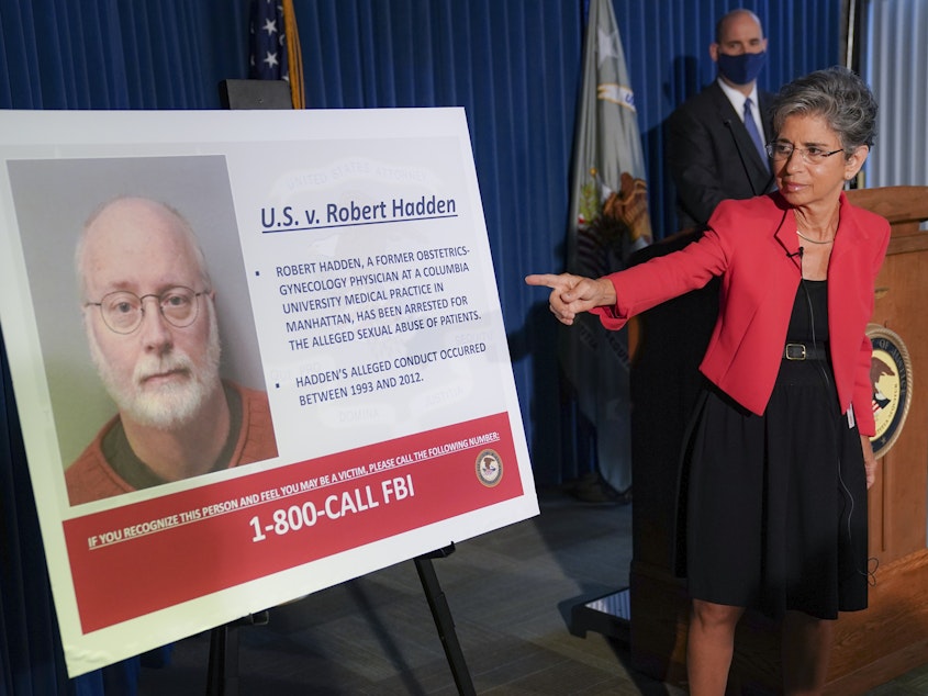 caption: Audrey Strauss, acting U.S. attorney for the Southern District of New York, points to an image of Robert Hadden during a news conference Wednesday to announce his arrest and indictment.