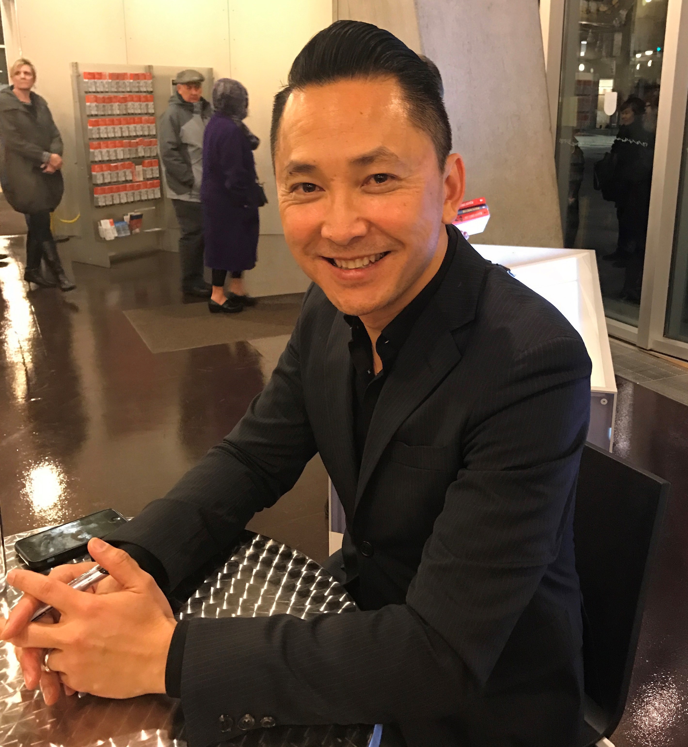 caption: Author Viet Thanh Nguyen at Seattle Public Library