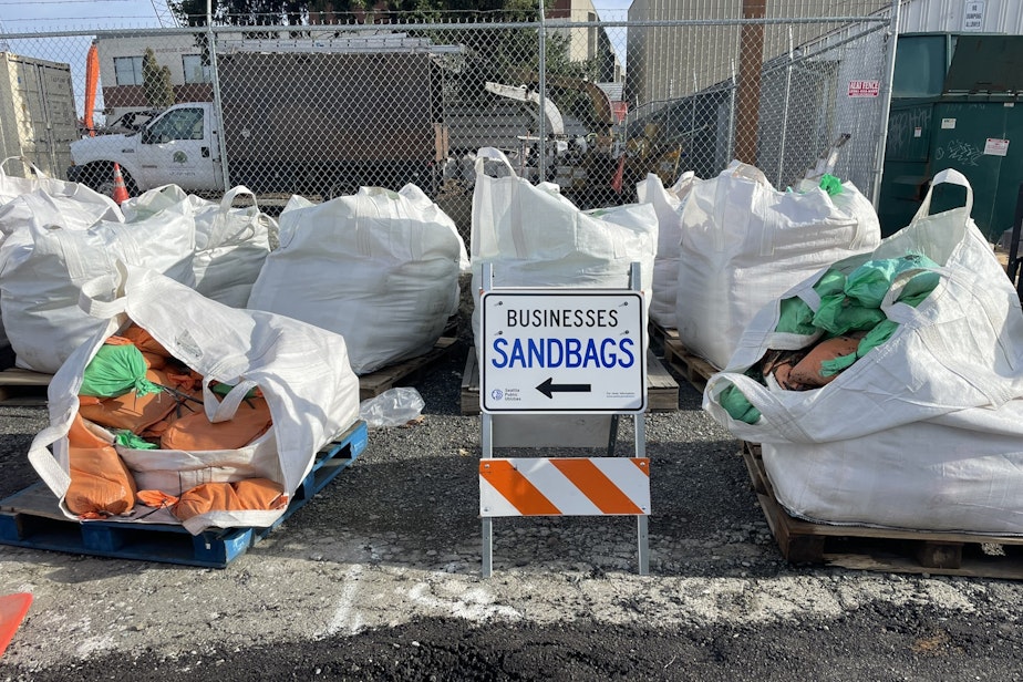 caption: Sandbags for businesses in South Park in November 2023