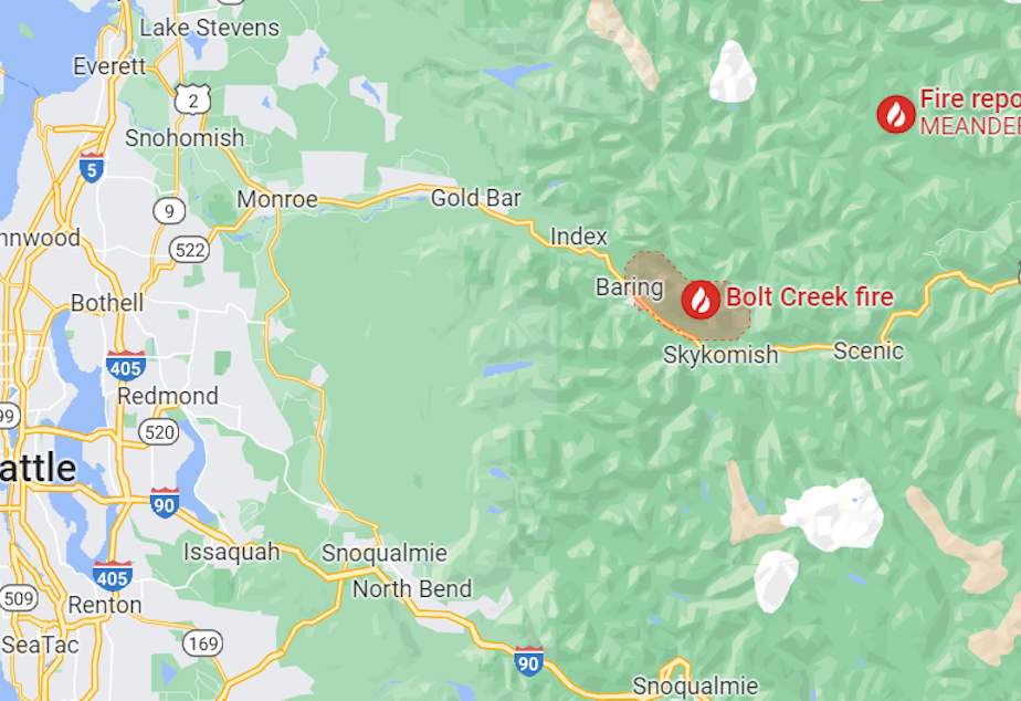 caption: A Google Maps view of the Bolt Creek fire near Stevens Pass. The fire is a 50 minute drive from north Seattle.