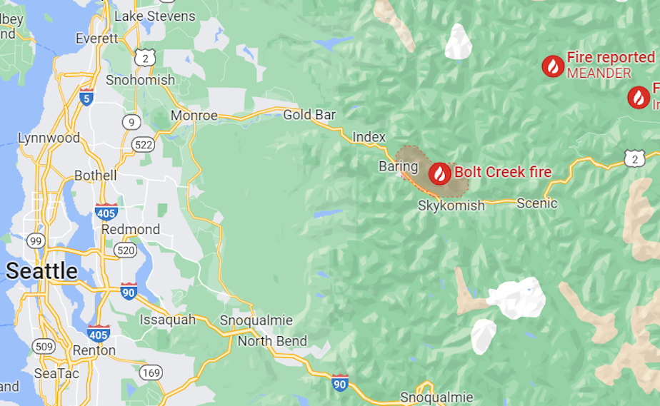 caption: A Google Maps view of the Bolt Creek fire near Stevens Pass. The fire is a 50 minute drive from north Seattle.