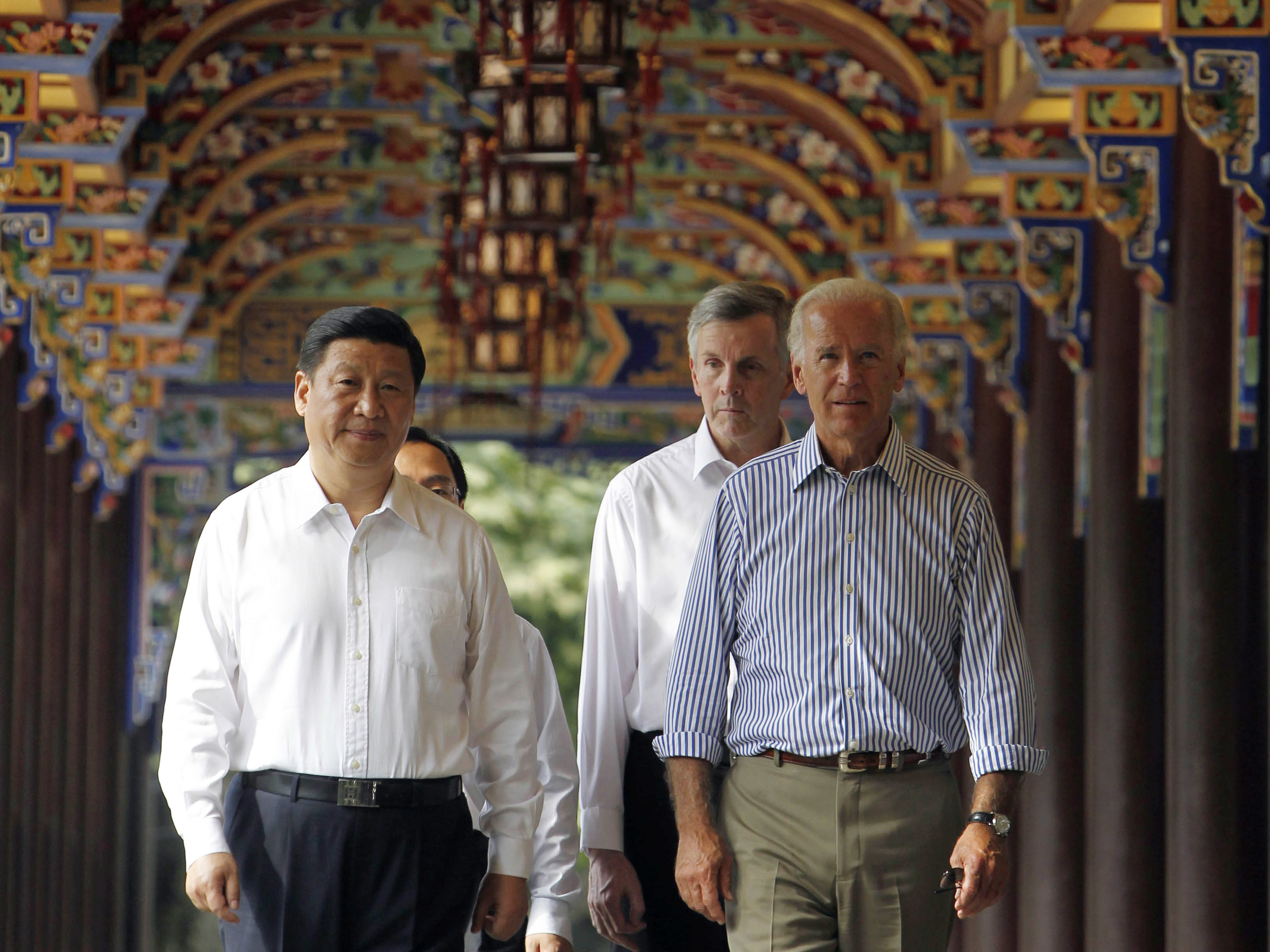 caption: In this 2011 photo, then-U.S. Vice President Joe Biden walks with then-Chinese Vice President Xi Jinping in southwestern China. Both are now presidents of their countries at a time when U.S.-China relations have been growing increasingly tense.