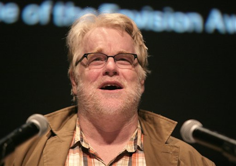 caption: Actor Philip Seymour Hoffman appears onstage at the 2013 Envision Awards.