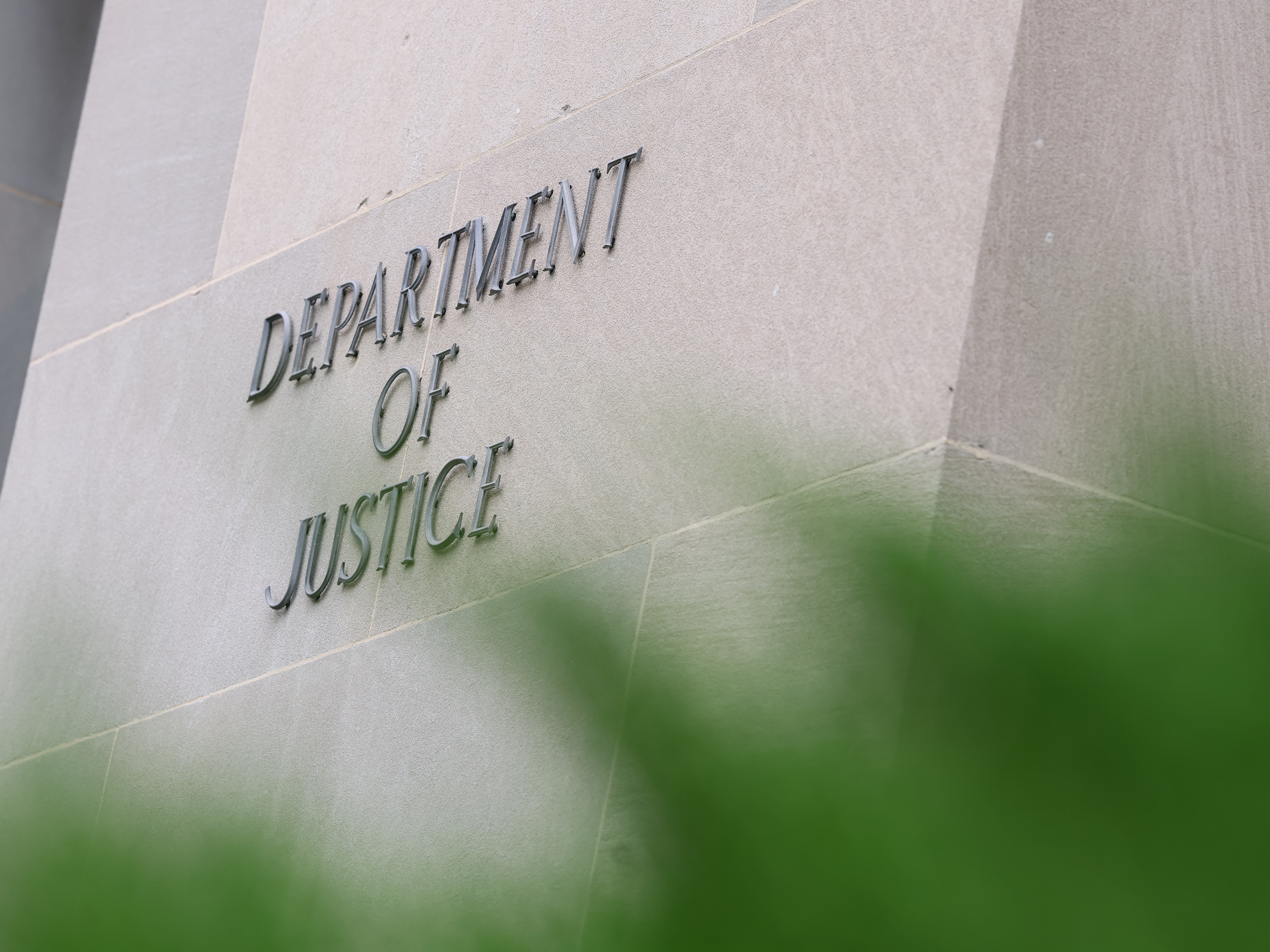 caption: The Department of Justice building is seen on July 18 in Washington, D.C.