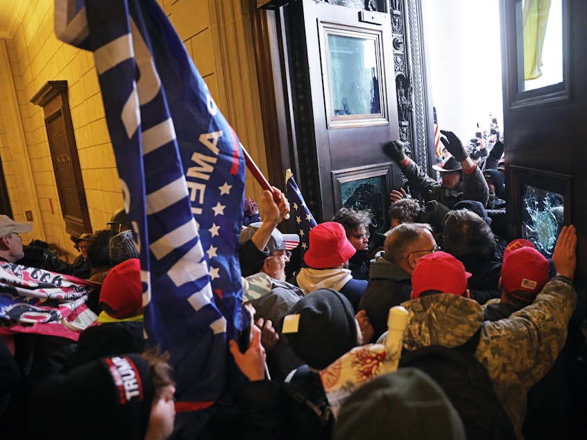 caption: Protesters supporting President  Trump break into the Capitol on Wednesday. D.C. Mayor Muriel Bowser has ordered a citywide curfew starting at 6 p.m. Wednesday.