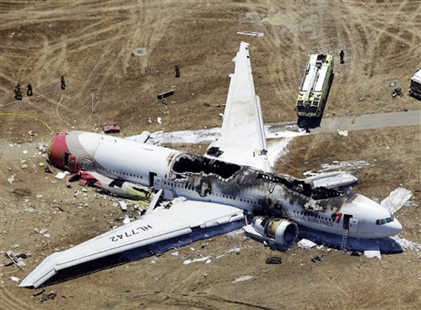 caption: This aerial photo shows the wreckage of the Asiana Flight 214 airplane after it crashed at the San Francisco International Airport in San Francisco, Saturday, July 6, 2013.