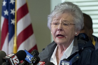 caption: On Thursday, Alabama Republican Gov. Kay Ivey (shown in March) apologized after a radio interview described her wearing blackface during a college skit in the 1960s.