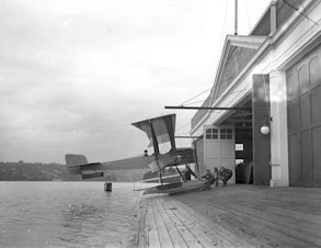 caption: The first Boeing airplane, the Bluebill, B&W Model 1, assembled and launched from Seattle's Lake Union