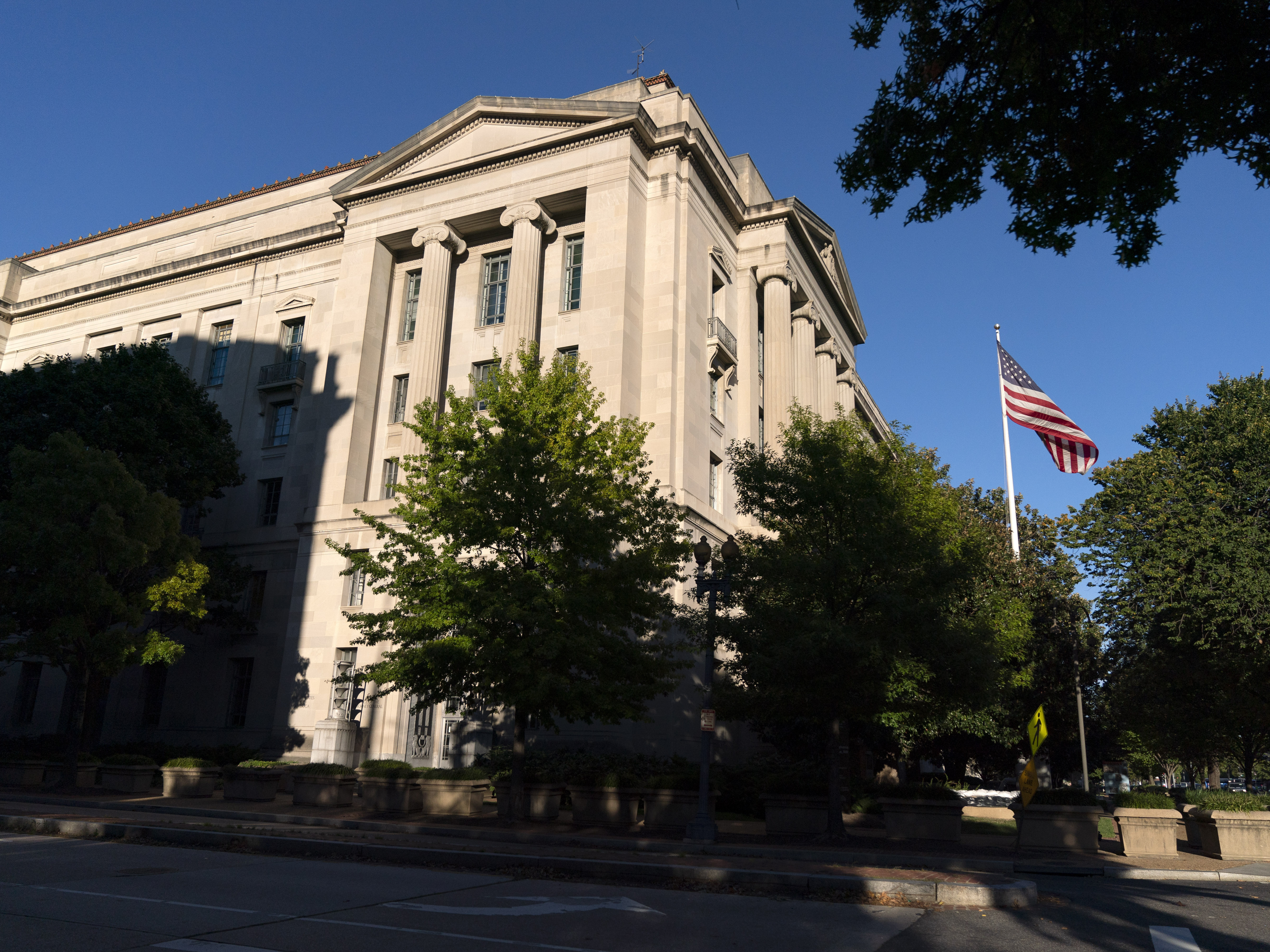 caption: The Justice Department is investigating possible schemes to exchange money for a presidential pardon, according to a document filed in federal court.