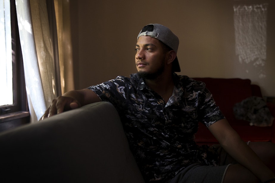 caption: Gustavo Portillo, 22, poses for a portrait on Wednesday, August 28, 2019, in Seattle. 