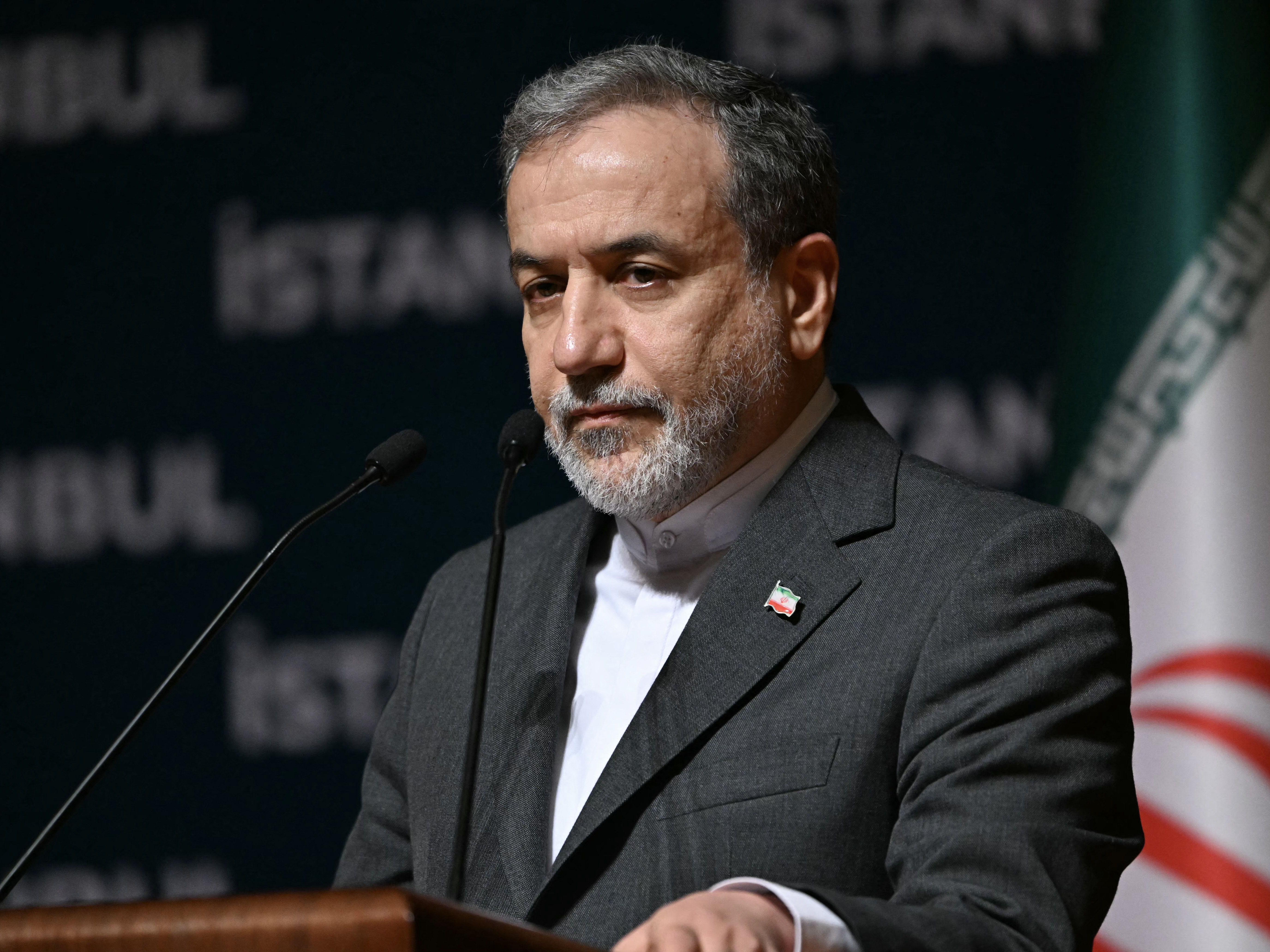 caption: Iran's foreign minister Abbas Araghchi speaks during a press conference in Istanbul on Sunday.