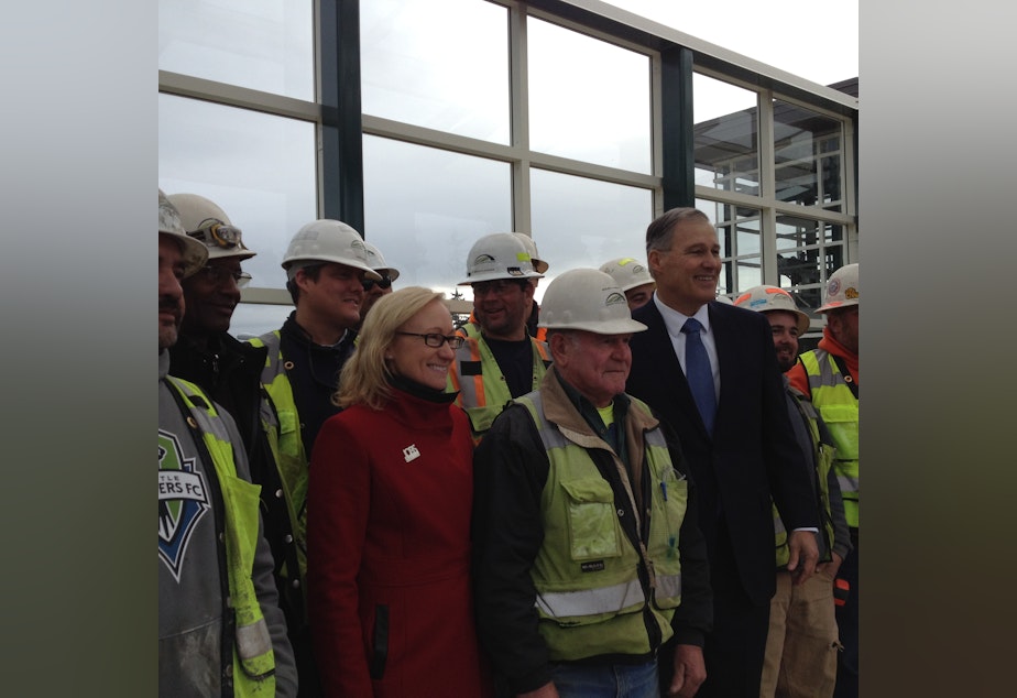 caption: Governor Jay Inslee unveiled a new transportation plan at a Eastside Transit Project site atop SR520 on Tuesday, Dec. 16, 2014