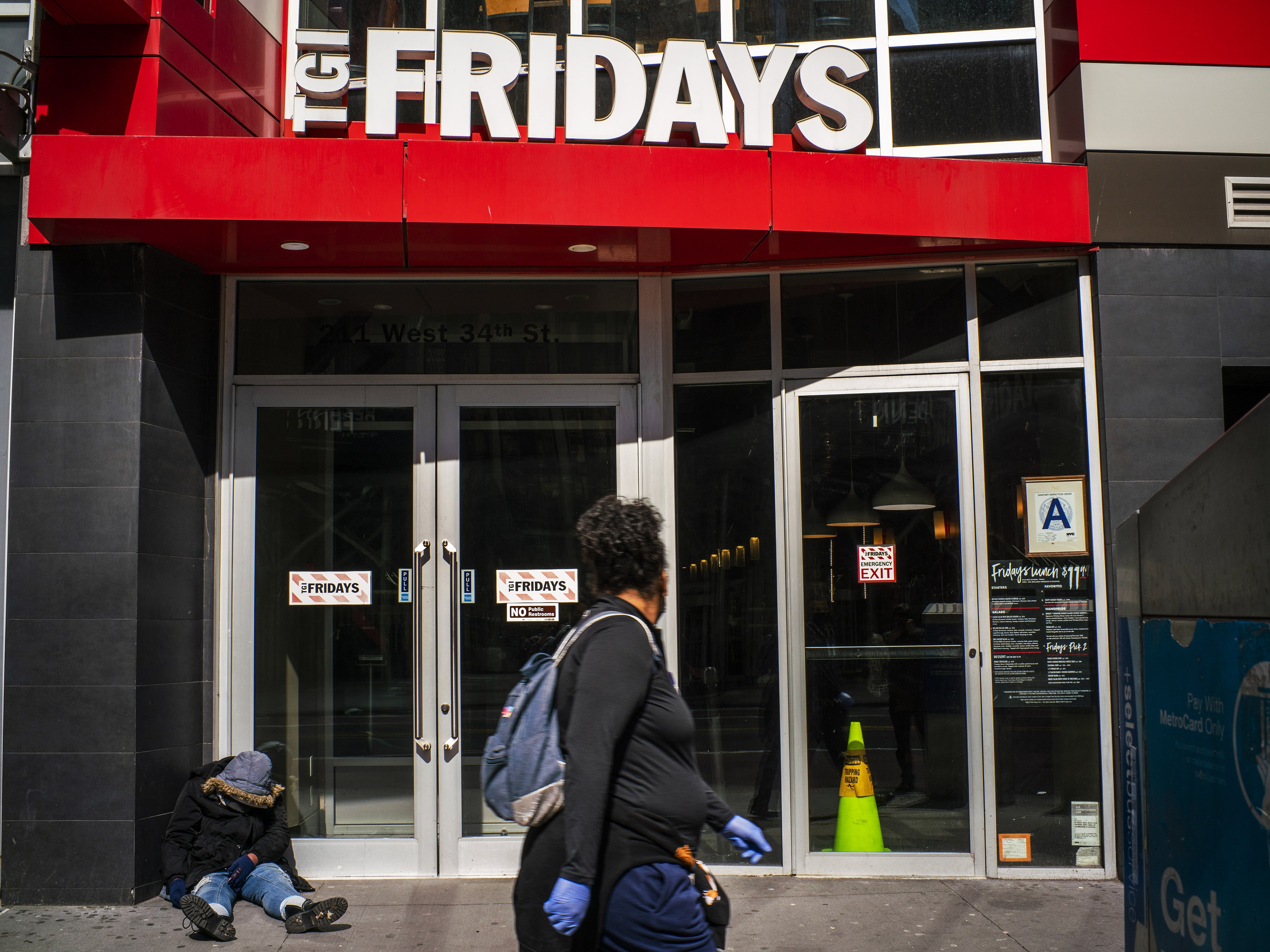 caption: A TGI Fridays is pictured in 2020 in Queens in New York City, when the streets were empty due to the coronavirus.