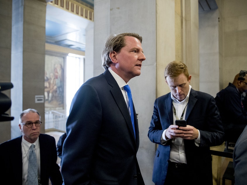 caption: Former White House Counsel Don McGahn arrives for an event at the Department of Justice in May 2019. On Monday, a federal judge ruled he must testify to House lawmakers who have attempted to subpoena him in the fact of White House orders from McGahn to no comply.