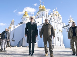 caption: President Joe Biden walks with Ukrainian President Volodymyr Zelenskyy at St. Michael's Golden-Domed Cathedral on a surprise visit on Feb. 20.