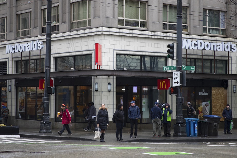 caption: The intersection of Third Avenue and Pine Street is shown on Thursday, January 22, 2020, less than 24 hours after a shooting left multiple victims injured and one dead in Seattle.
