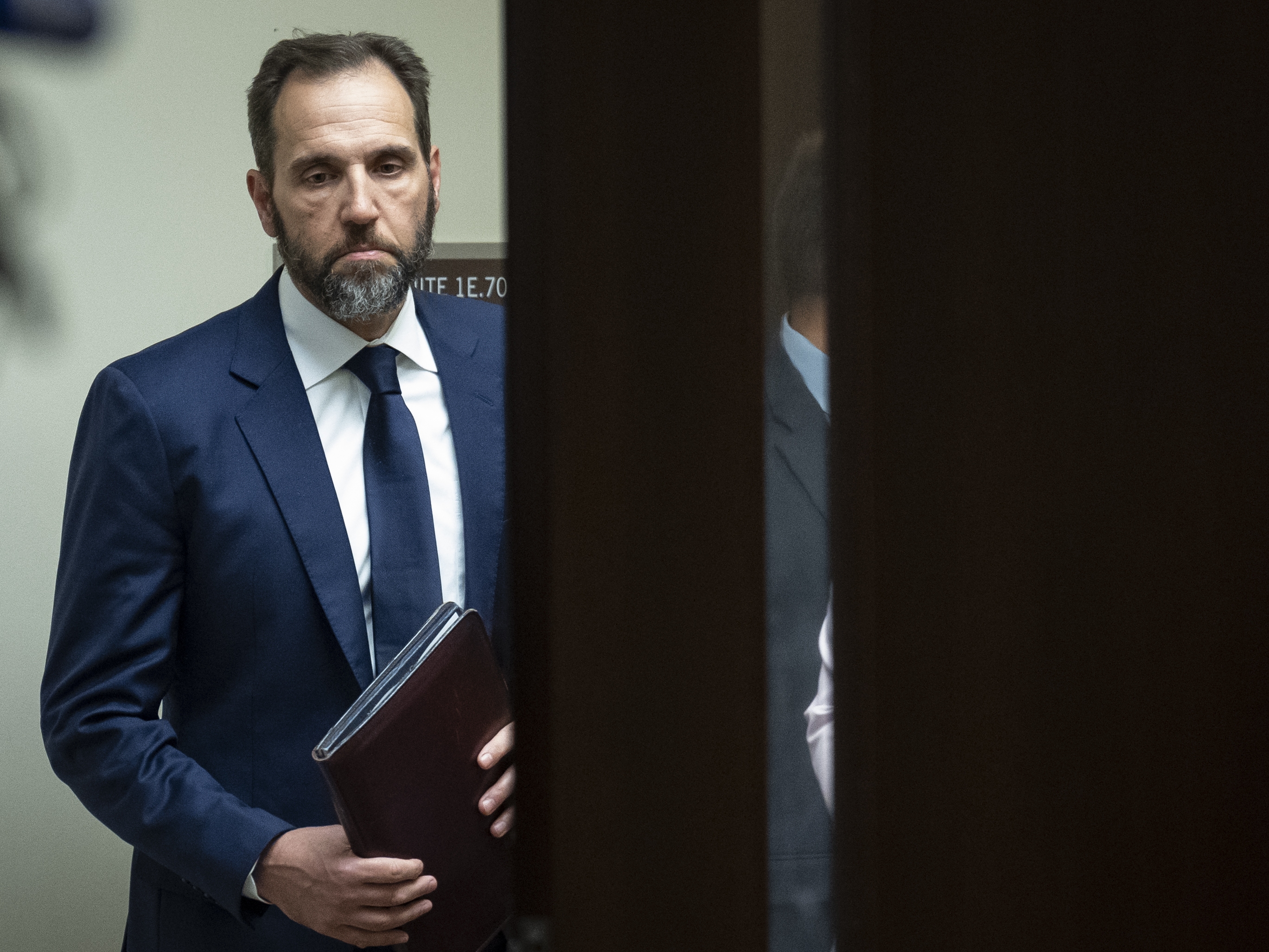 caption: Special Counsel Jack Smith arrives to give remarks on an indictment against Trump in 2023 in Washington, D.C.