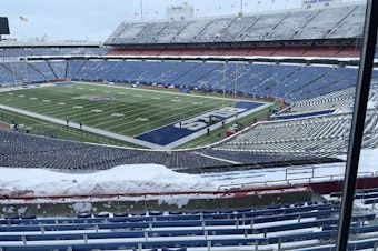 caption: A few flurries fall at the stadium mostly-cleared of snow in Orchard Park, N.Y, ahead of the NFL football game between the Buffalo Bills and Kansas City Chiefs on Sunday.