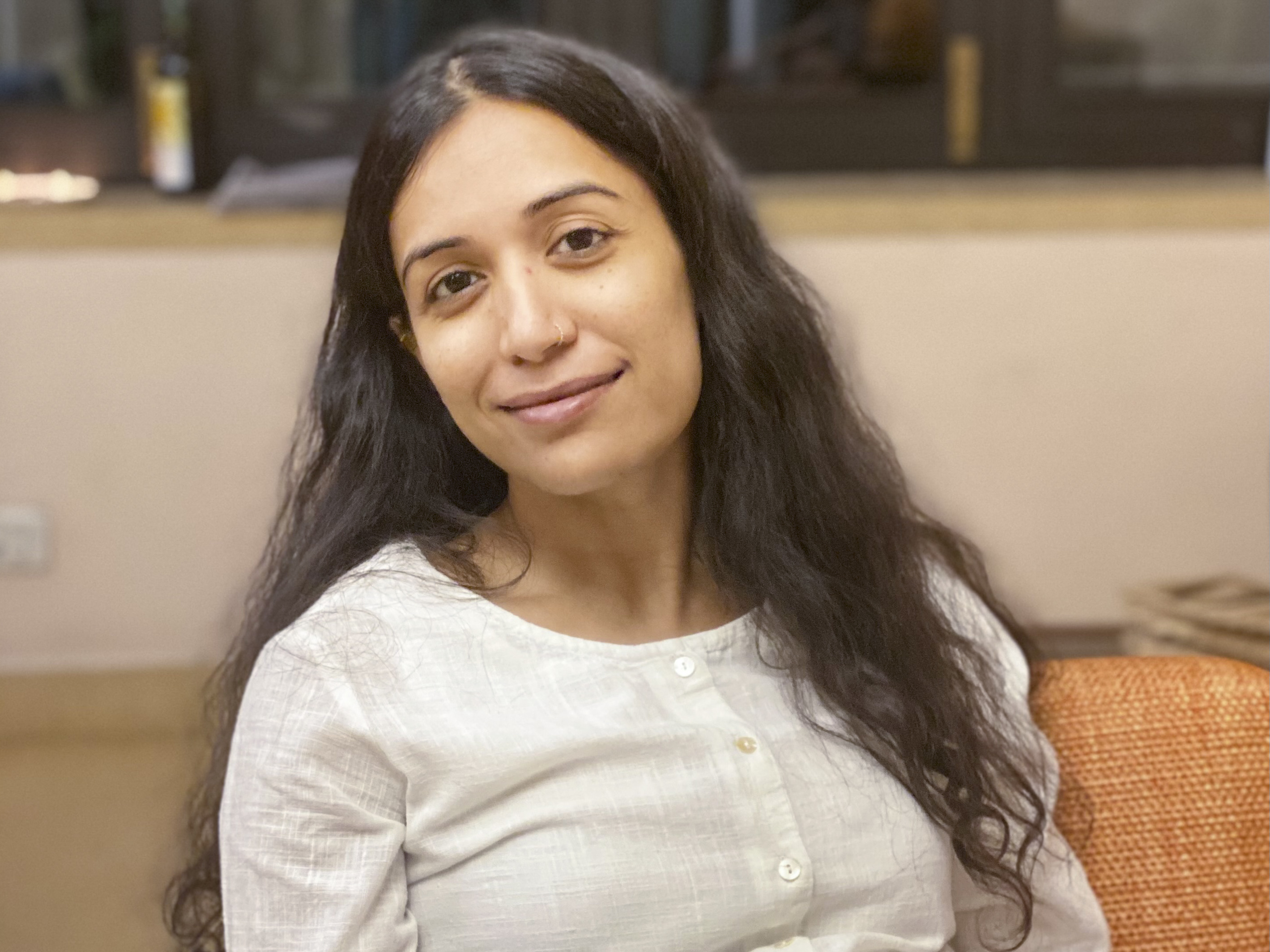 caption: Priyali Sur, 29 weeks pregnant, at home in Delhi on April 30.