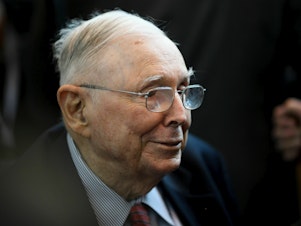 caption: Charlie Munger, the longtime vice chairman of Berkshire Hathaway, was a fixture at the company's annual shareholders meeting in Omaha, Nebraska.