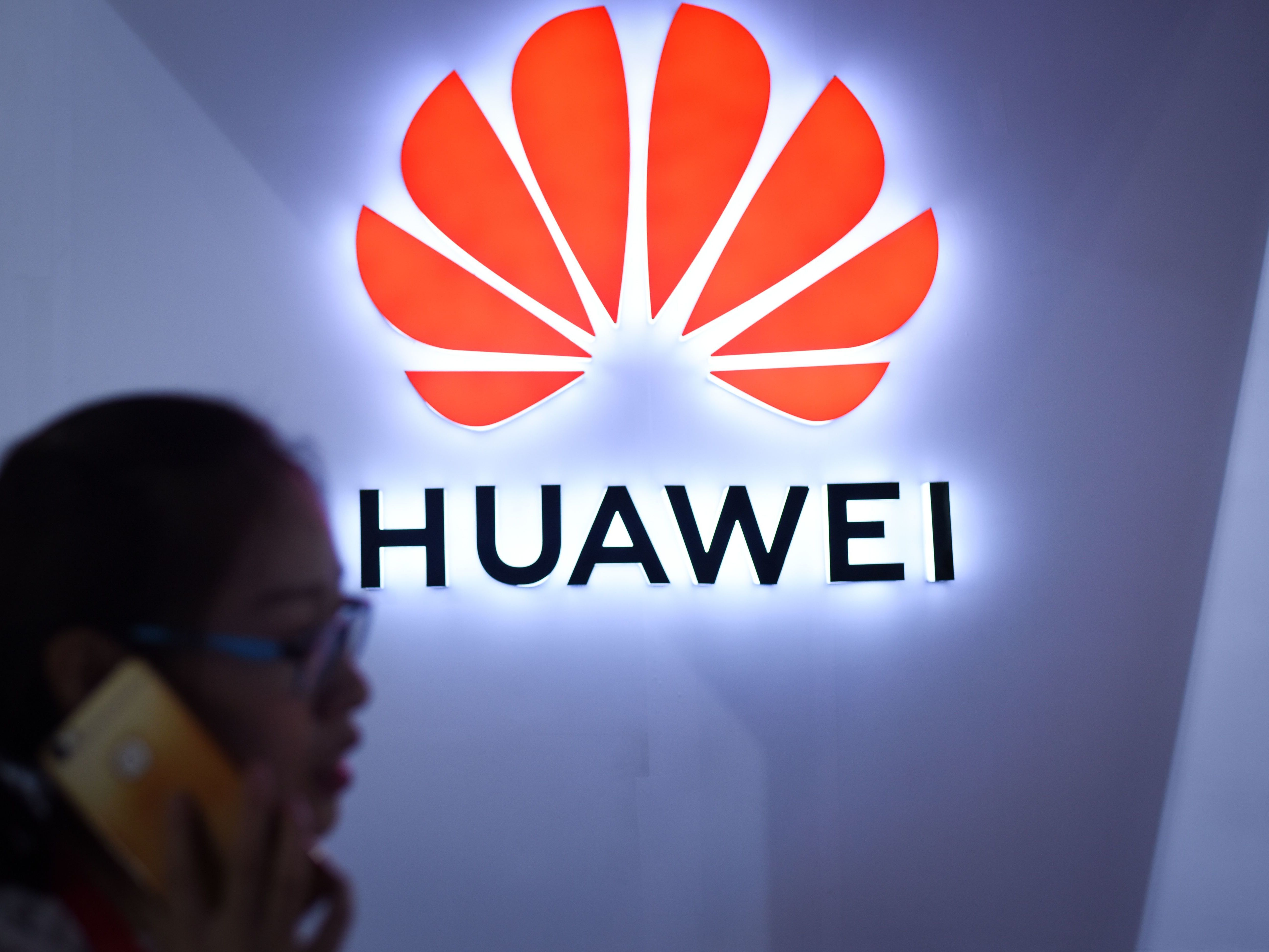 caption: The Trump administration issued tough export rules this month, which analysts say could spell a death knell for Huawei's worldwide mobile network ambitions.