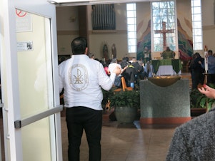 caption: Outreach at a Catholic church in Lakewood, WA helped census workers reach immigrants and other people at greater risk of not being counted. 