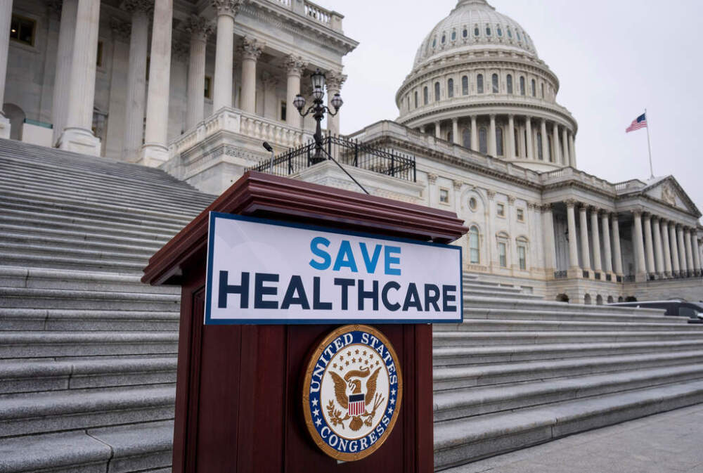 caption: House Democrats prepare to speak on the steps of the Capitol to insist that Republicans include an extension of expiring health care benefits as part of a government funding compromise, in Washington, Tuesday, Sept. 30, 2025. (AP Photo/J. Scott Applewhite)