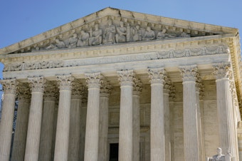 caption: The U.S. Supreme Court is adopting a code of ethics for justices.
