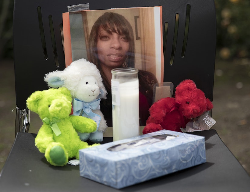 caption: A photograph of Charleena Lyles is shown at a memorial outside of Solid Ground Brettler Family Place on Monday, June 18, 2017, in Seattle, Washington. Lyles was shot and killed by Seattle police officers. 