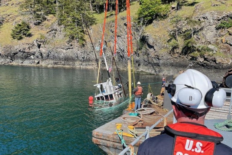 caption: Salvage crews lift the fishing vessel Chief Joseph from Haro Strait off Henry Island, Washington, on May 10, 2024.