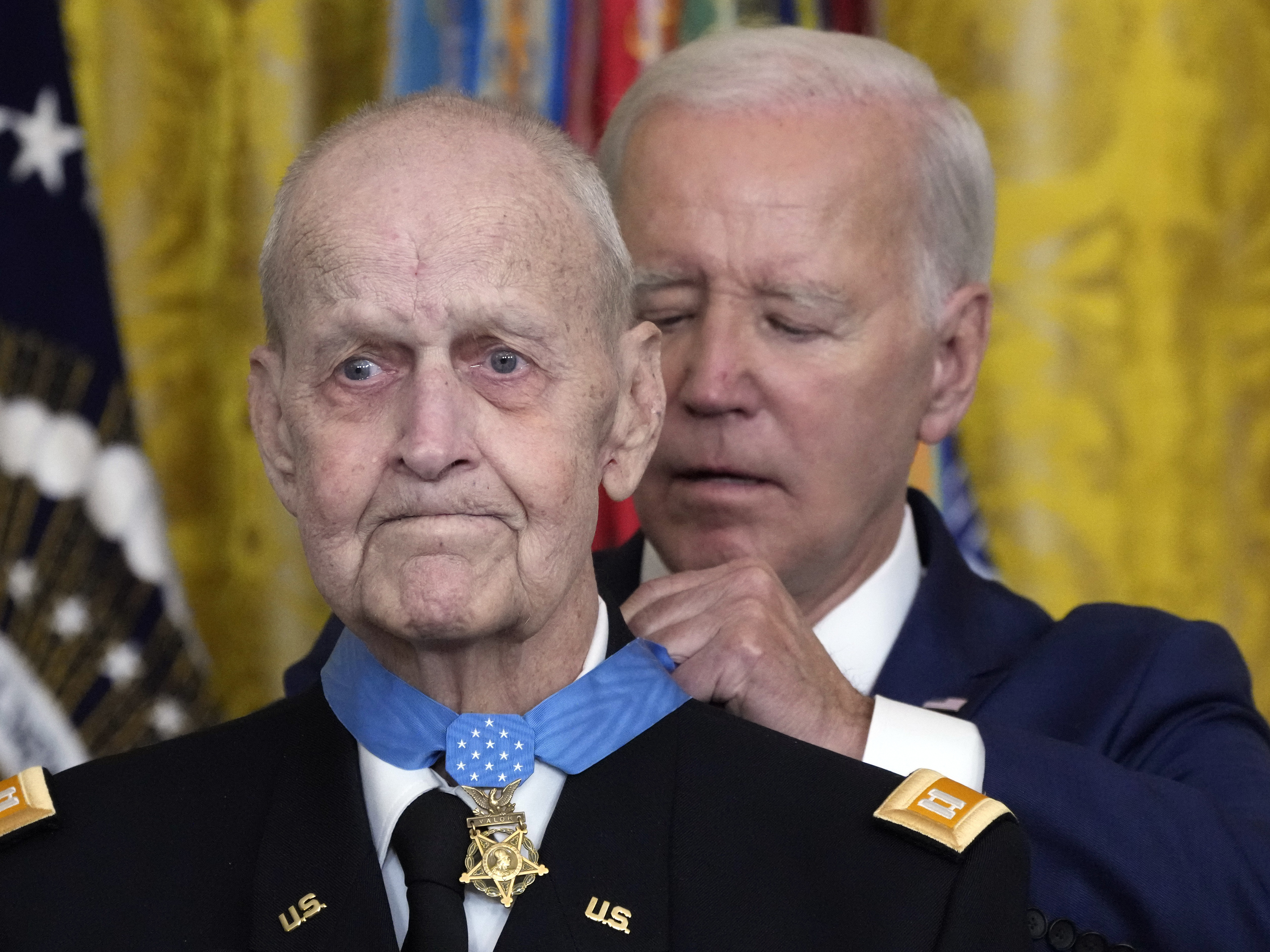 caption: President Joe Biden awards the Medal of Honor to Capt. Larry Taylor, an Army pilot from the Vietnam War who risked his life to rescue a reconnaissance team that was about to be overrun by the enemy, during a ceremony Tuesday, Sept. 5, 2023, at the White House.